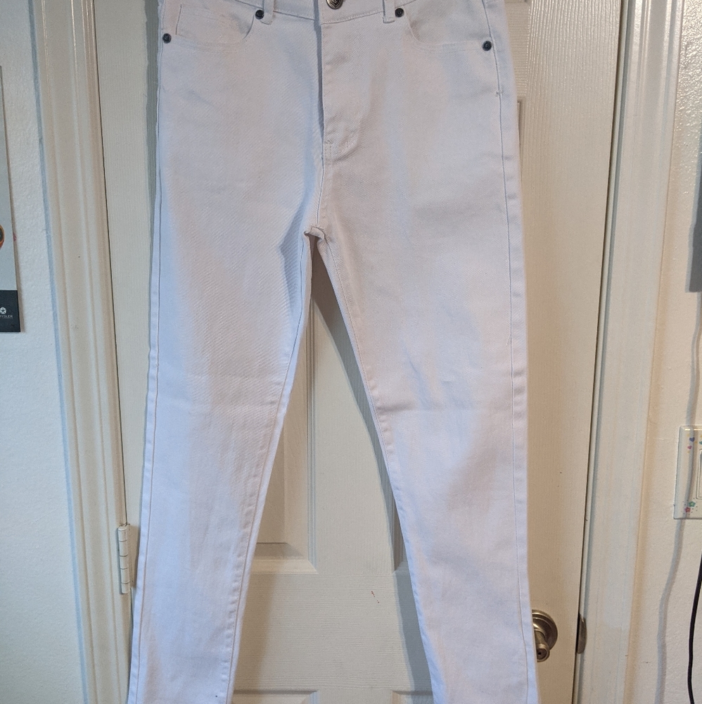 Encrypted white skinny jeans